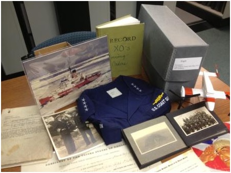 A photo of some examples of Coast Guard artifacts and archival items
