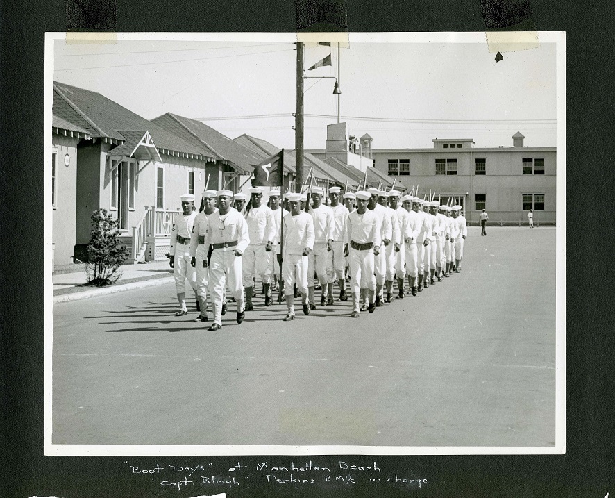 A 1943 photograph showing Company 7 marching in dress whites. Among the company’s members was Joseph Jenkins who later became the Coast Guard’s first recognized African-American officer. (Coast Guard Collection)