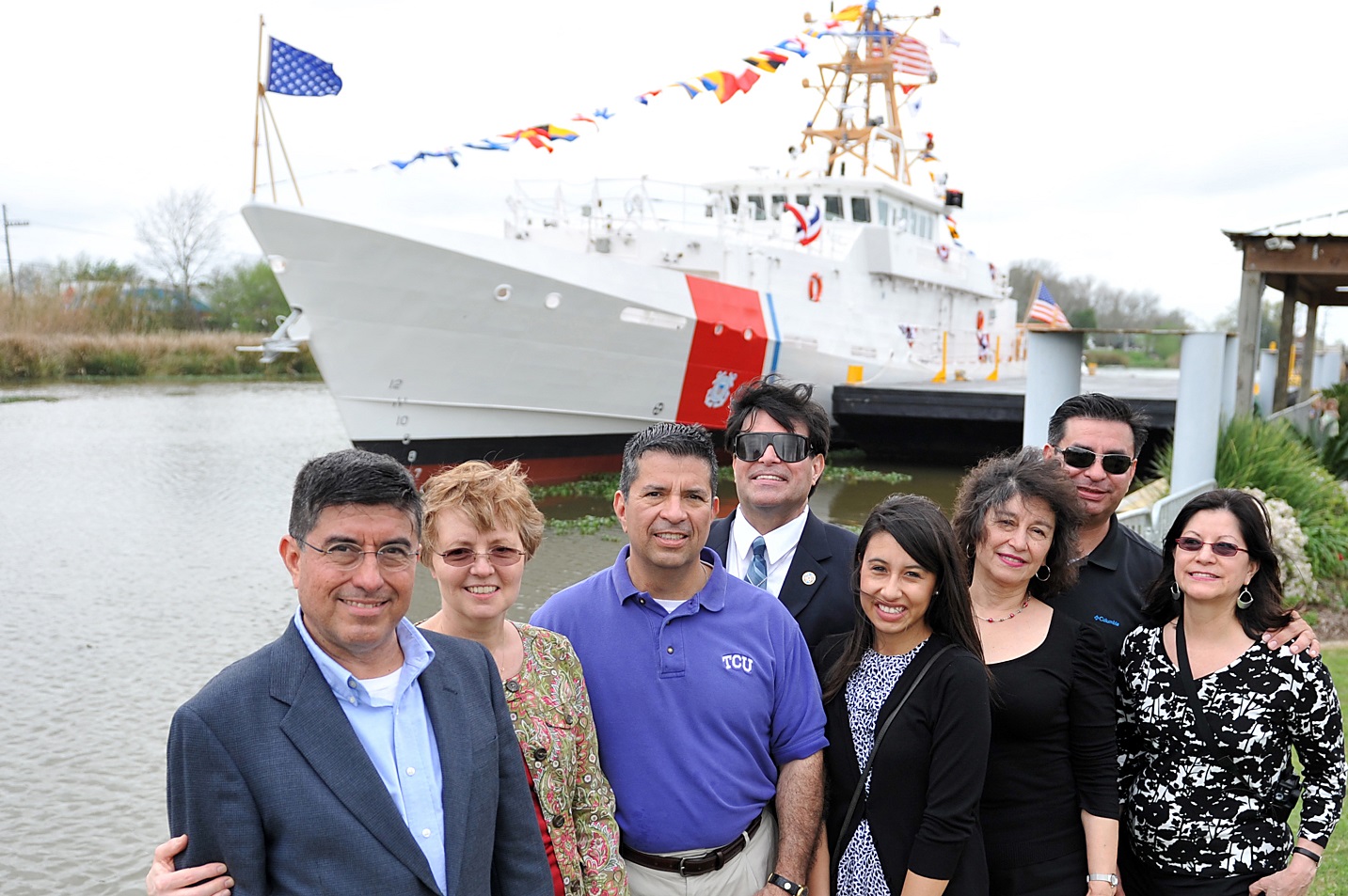 7.	The Flores family stand in front of the newly commissioned Fast Response Cutter William Flores (WPC-1103). (U.S. Coast Guard)