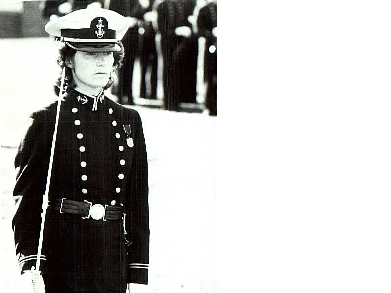 Cadet Kathy Hamblett drilling in dress uniform with sword. (U.S. Coast Guard Photo) 