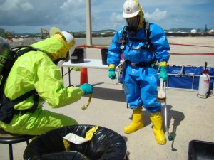 Atlantic Strike Team members walk through a decontamination line in level B response gear during an exercise Aug. 28, 2007. (U.S. Coast Guard photograph by CDR David Haynes) Atlantic Strike Team members walk through a decontamination line in level B response gear during an exercise Aug. 28, 2007. (U.S. Coast Guard photograph by CDR David Haynes)